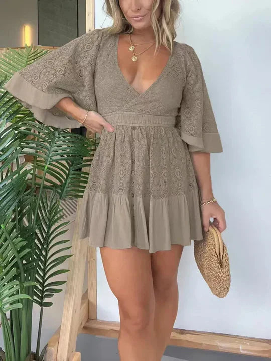 Leonora - Elegant lace mini dress with V-neck and batwing sleeves