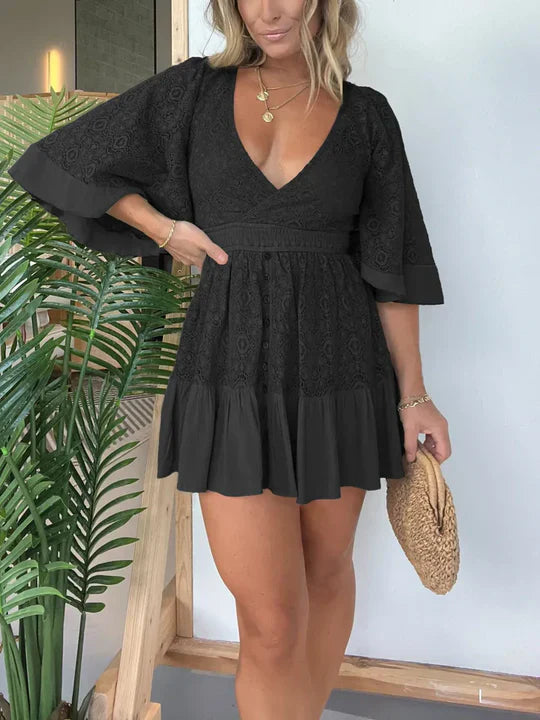 Leonora - Elegant lace mini dress with V-neck and batwing sleeves
