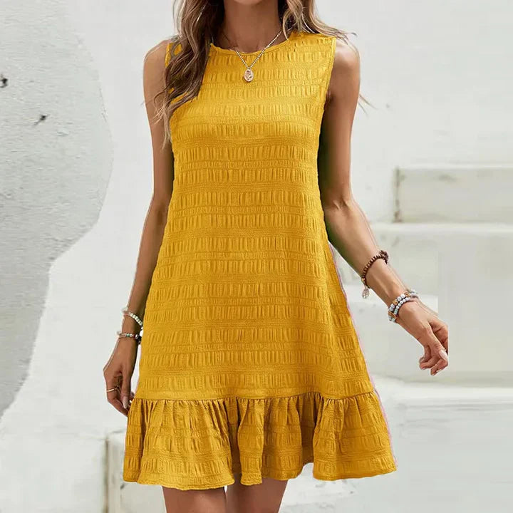 Milena - Stylish sleeveless textured ruffle-hem mini dress