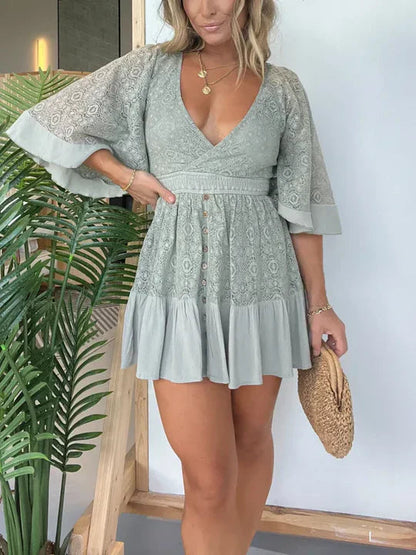 Leonora - Elegant lace mini dress with V-neck and batwing sleeves