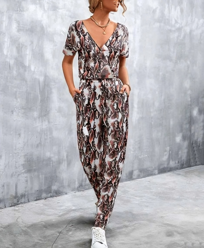 Olivette - Elegant printed deep V-neck jumpsuit