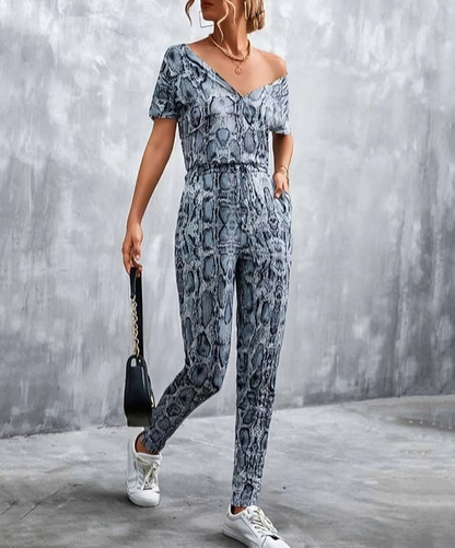 Olivette - Elegant printed deep V-neck jumpsuit