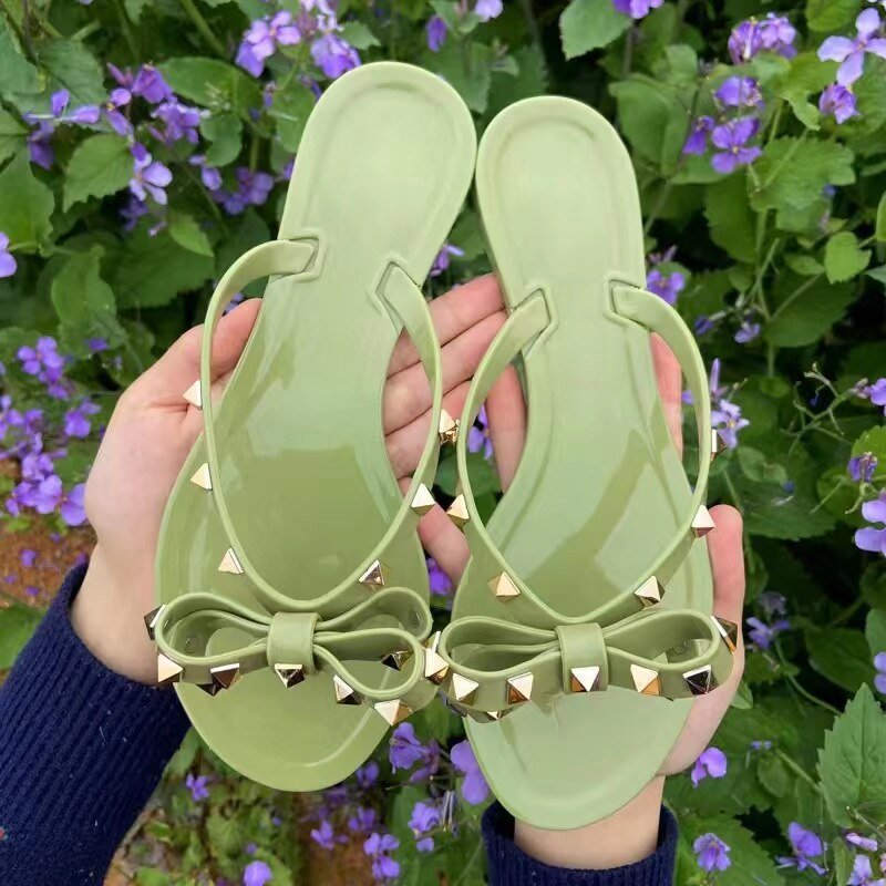 Evelyn's Chic Studded Bow Flip-Flops | Trendy Casual Sandals with Rivets and Comfort | Stylish, Durable, Easy Care